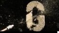 Sand Blow Test 8 - Wet Sand/Vermiculite Mix - 2 air nozzles- 400fps Image