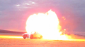 Car Driving Through Flame Burst Image